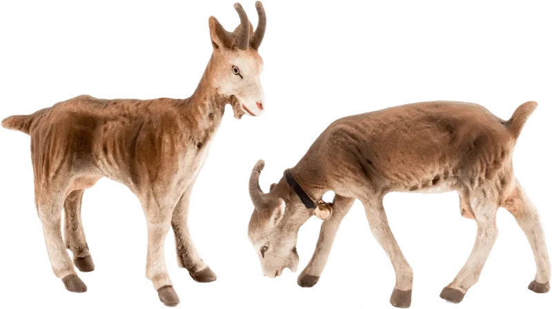 Three hand-painted papier-mâché goats in standing, grazing, and resting poses with brown tones