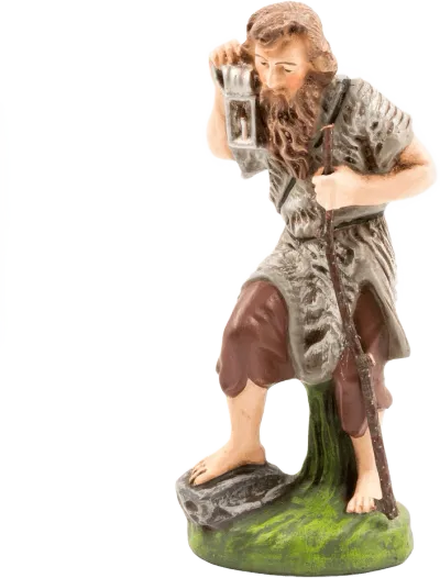 Hand-painted papier-mâché shepherd figure holding lantern and staff, standing barefoot on green base