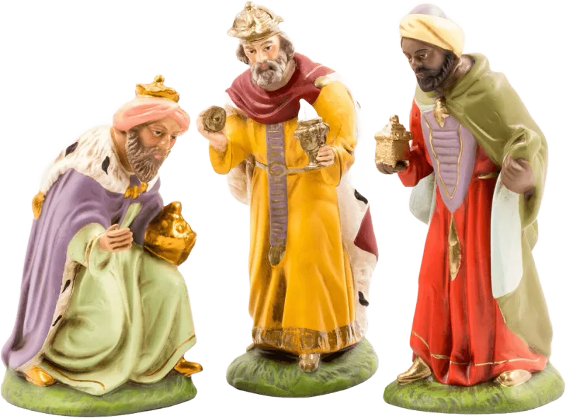 Three hand-painted papier-mâché Wisemen figures in colorful robes with gold accents on green bases