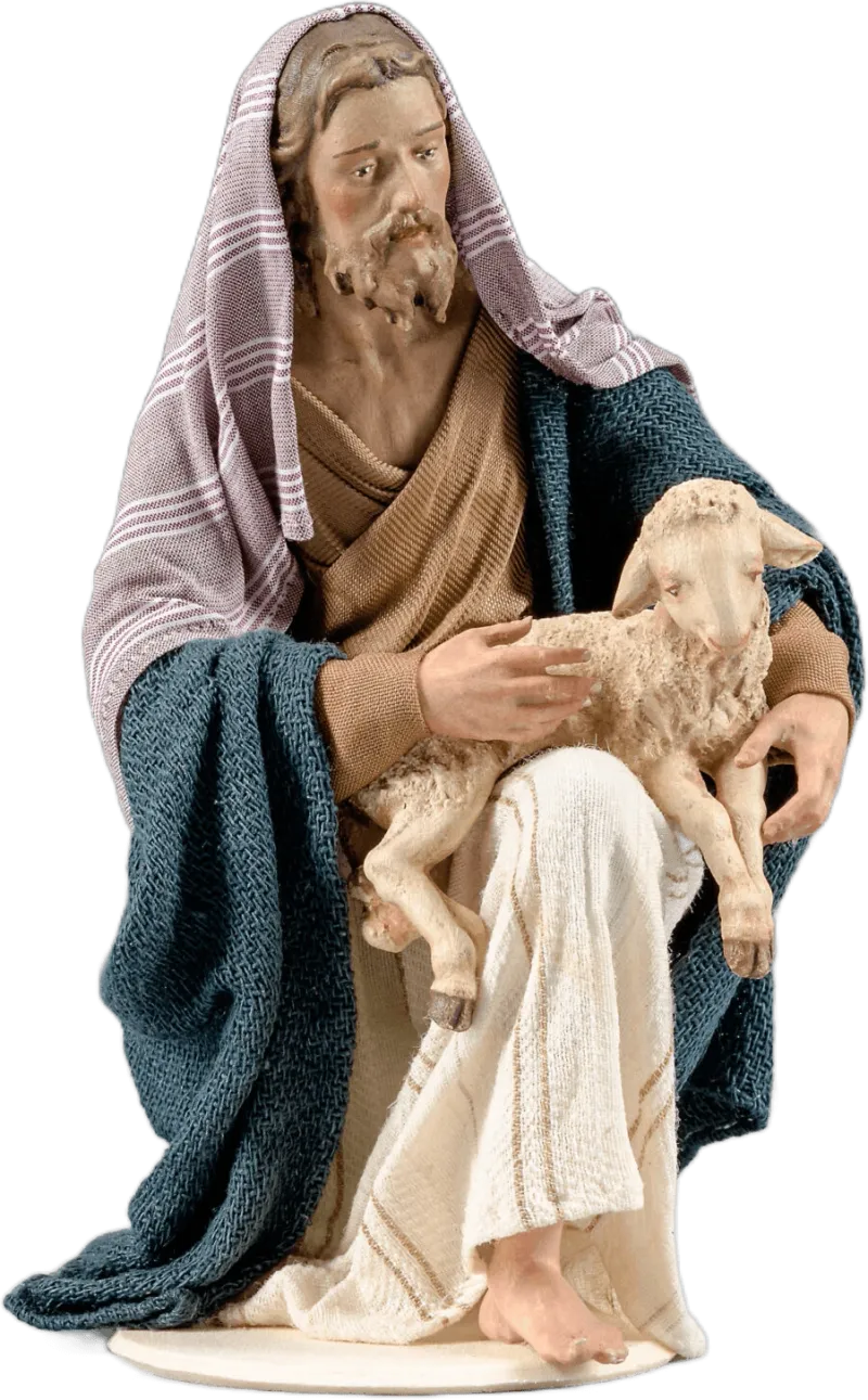 Shepherd kneeling with lamb – nativity figure by Original Heide