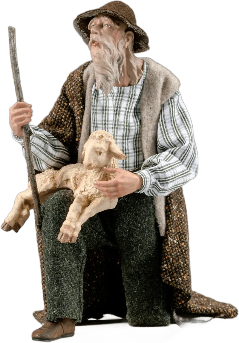 Shepherd kneeling with lamb – nativity figure by Original Heide