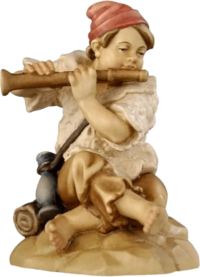 Hand-carved wooden figure of a boy sitting playing a flute, painted in natural tones with a red cap