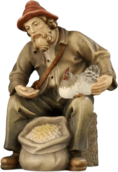 Shepherd Sitting with Hen – nativity figure by Pema Woodcarvings